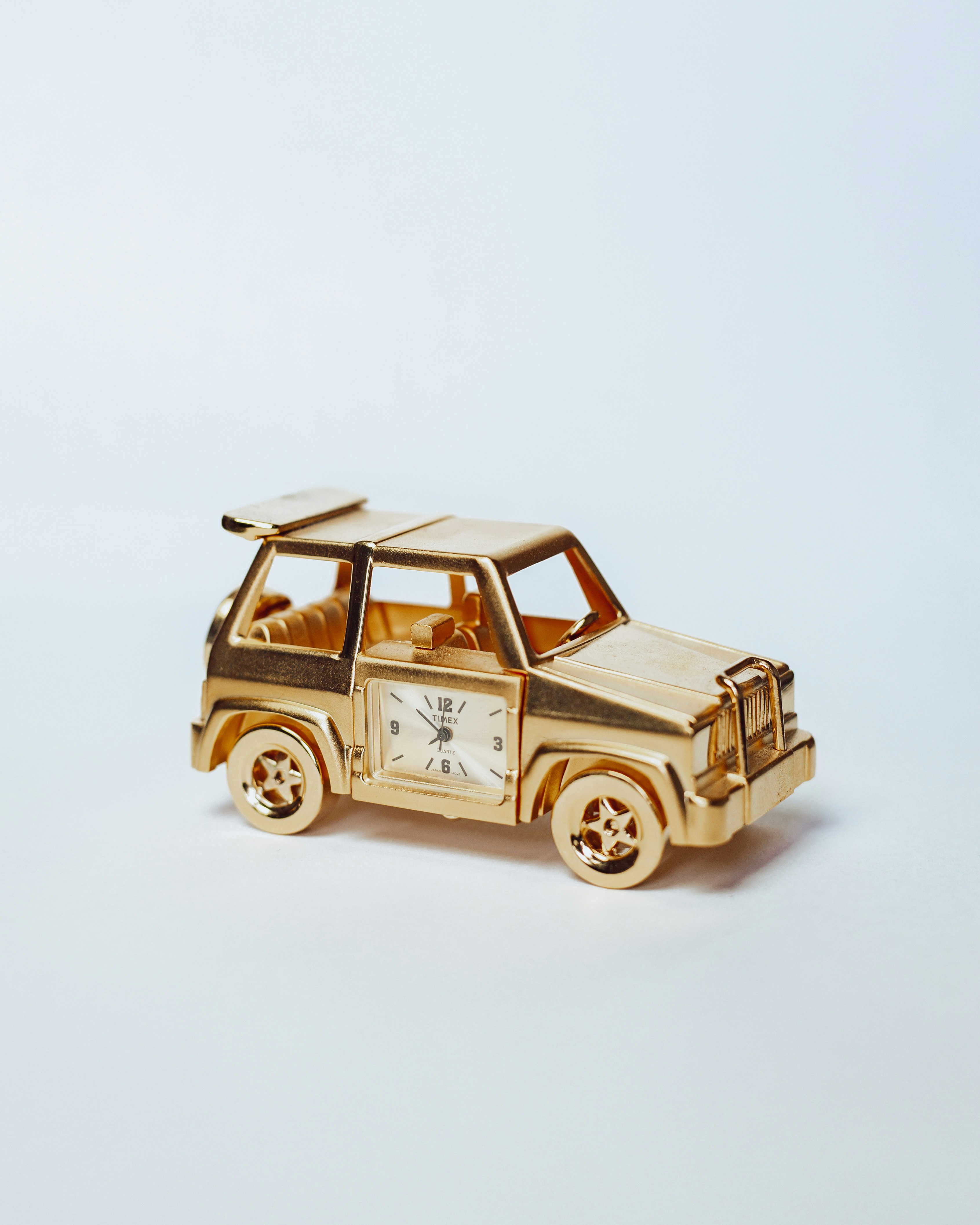 brown and white car scale model